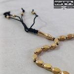 نمای نزدیک از دونه‌های براق و نانو شده برای خرید تسبیح برنجی با دوام